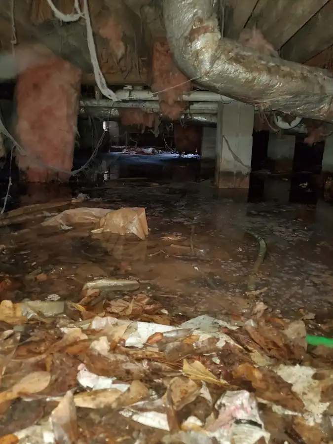Crawl space flood assessment for Commercial Water Damage Restoration in Topsfield