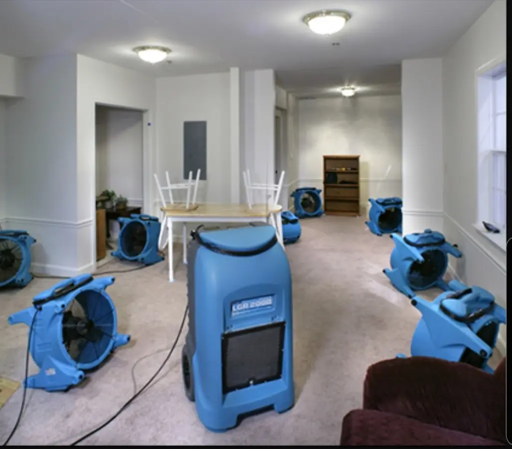 Air movers and dehumidifier setup for Water Damage Restoration in Topsfield